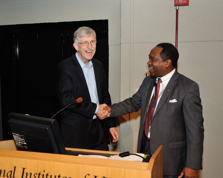 NIH Director Dr. Francis Collins shaking hands with NIDDK Director Dr. Griffin P. Rodgers