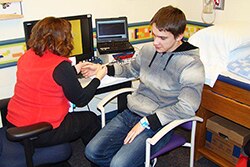 Photo of Malachi Gerke getting a vascular test