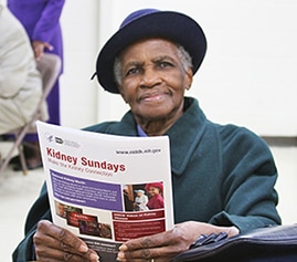 Photo of Willie M. Allen holding NIDDK Kidney Sundays educational materials