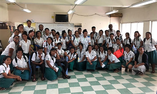 Photo of Dr. Griffin P. Rodgers and Dr. Lawrence Agodoa with students from Laura High School, Marshall Islands