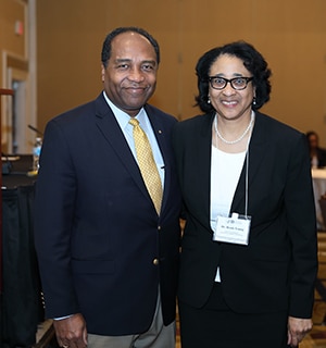 photo of Dr. Griffin P. Rodgers with Dr. Bessie Young at the 16th annual NMRI workshop.