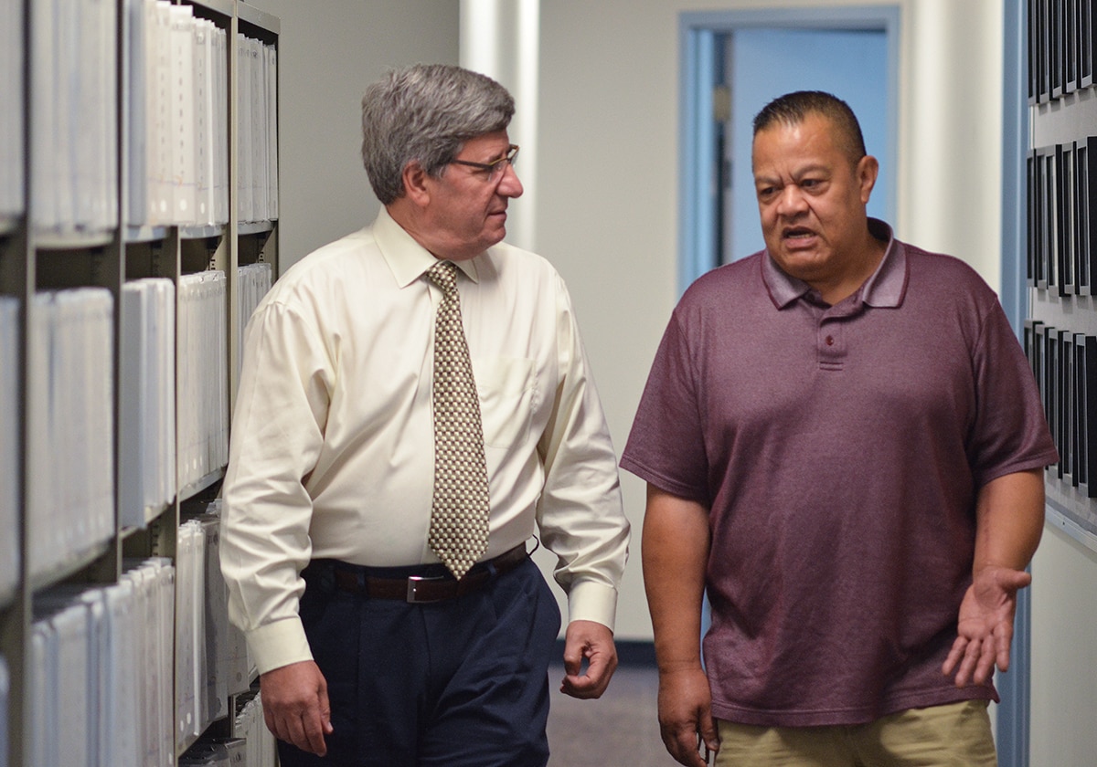 Two men discuss the Restoring Insulin Secretion Adult and Pediatric Medication Studies.