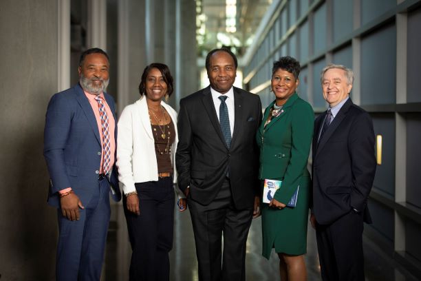Dr. Griffin Rodgers with hosts and honored guests at Johns Hopkins event