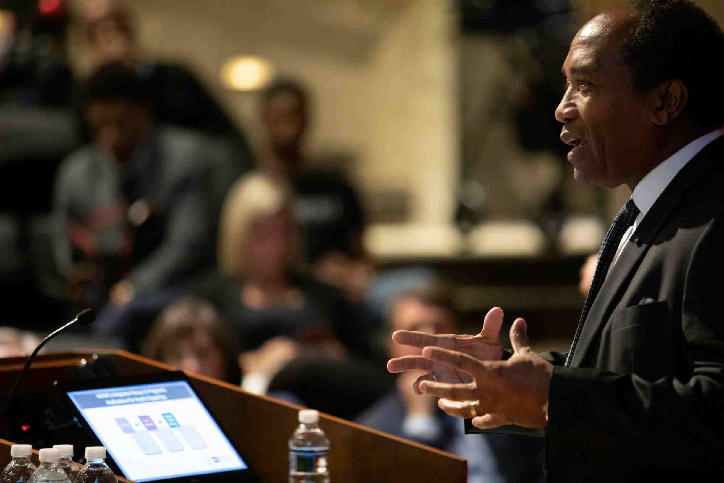 Dr. Rodgers speaking at podium