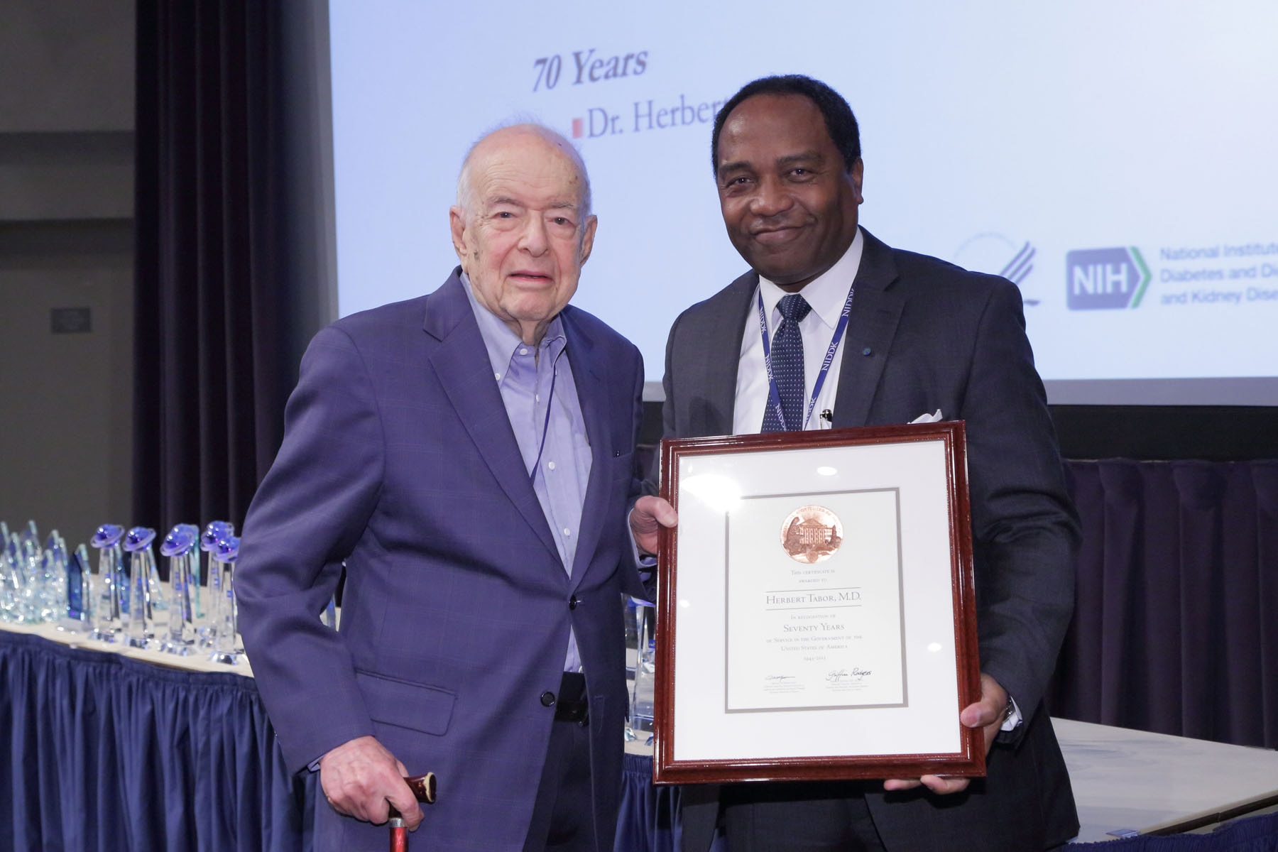 Dr. Rodgers and Herbert Tabor - Dr. Griffin P. Rodgers presenting Dr. Herbert Tabor with an award