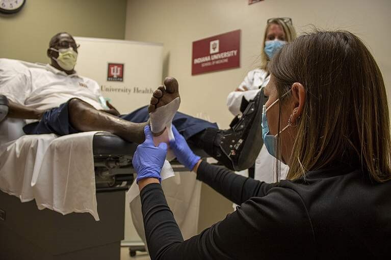 Person getting their foot examined