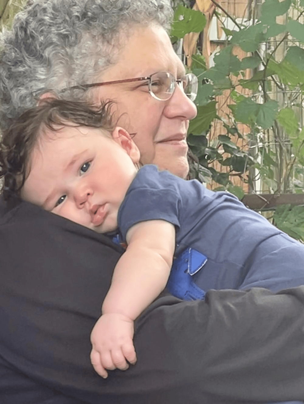 Interviewee with her grandchild.