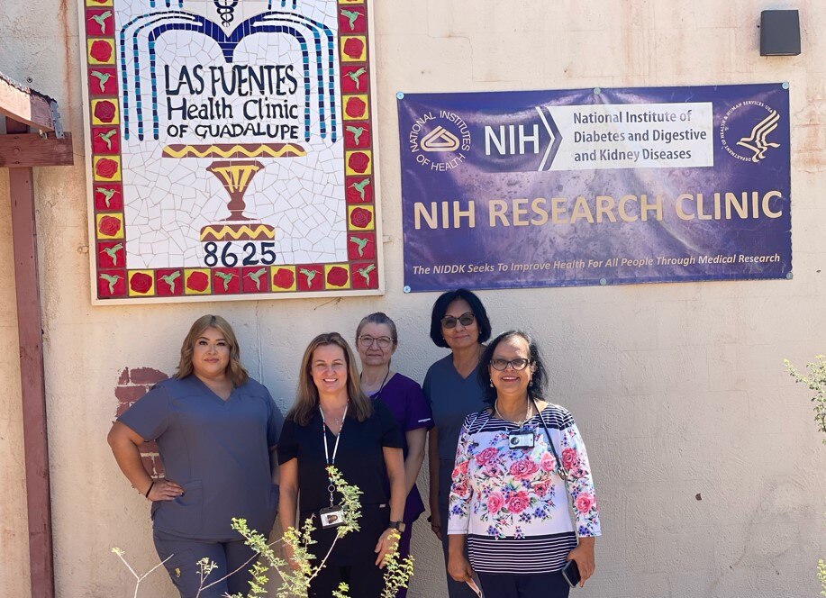 NIDDK staff stand outside a clinic