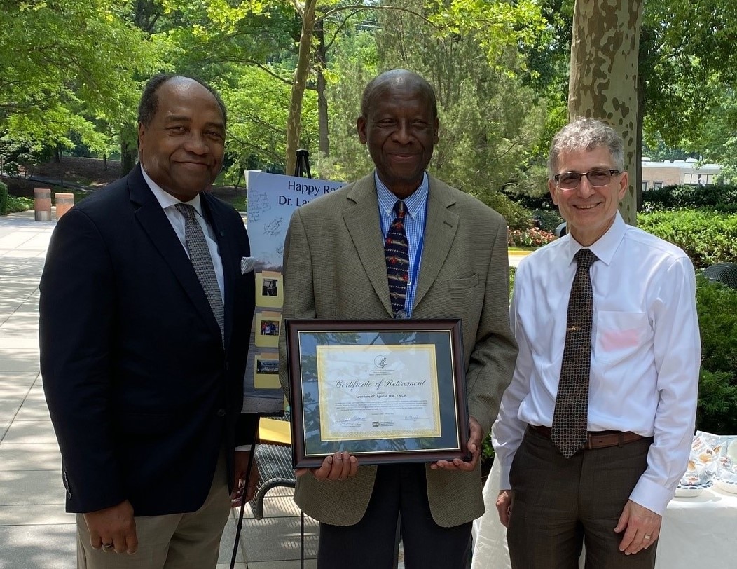 Three NIDDK leaders standing together at a retirement event