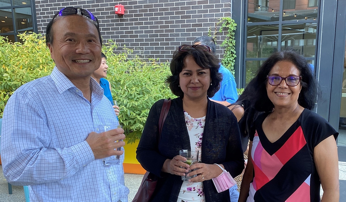 NIH staff socializing at a summer event.