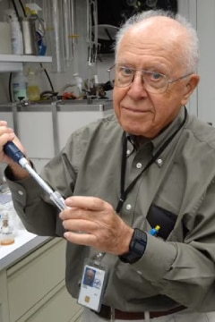 Dr. Enrico Cabib working in his NIH lab.