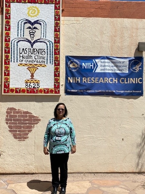 NIDDK’s Dr. Madhumita Sinha standing outside community research clinic in Arizona