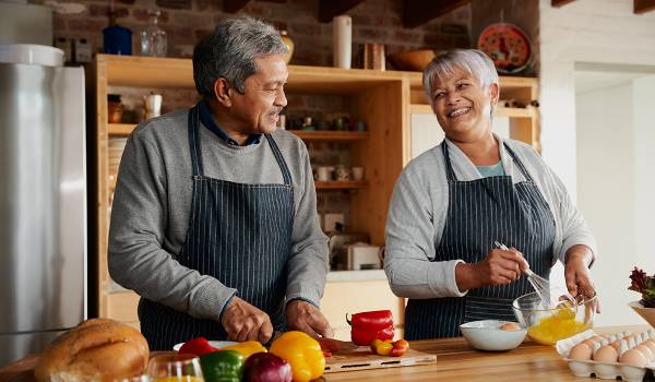 Two people cooking.