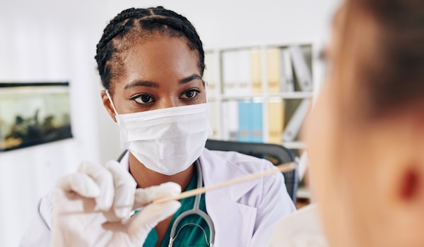 Doctor treating patient