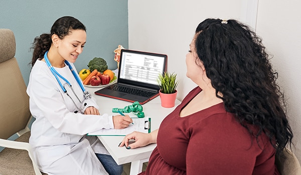 Health care professional working with patient