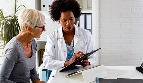 Doctor talking to patient