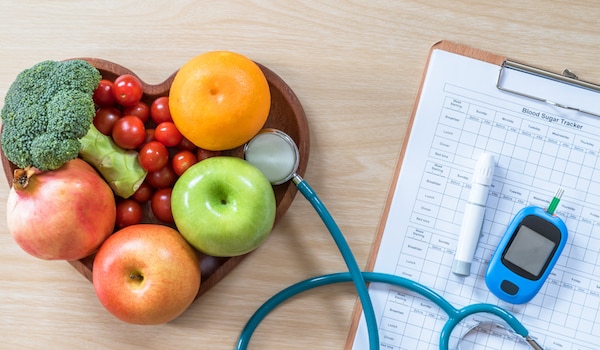 Diabetes monitor with fruits and vegetables