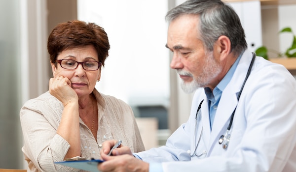 A doctor talking to a patient