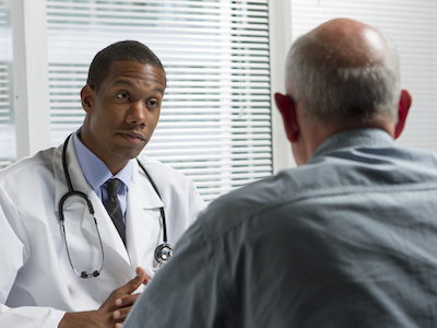 Doctor talking with a patient.