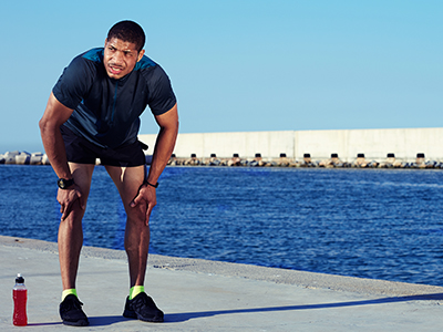 Man taking a break from exercise
