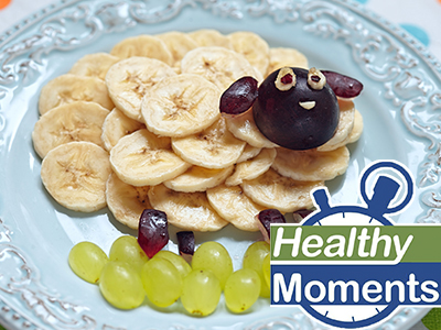 Fruit arranged on a plate in the shape of a sheep