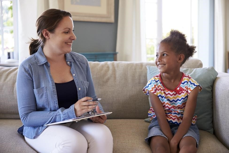 Child talking with a therapist.