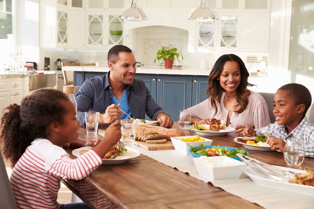 A family eating a healthy dinner.