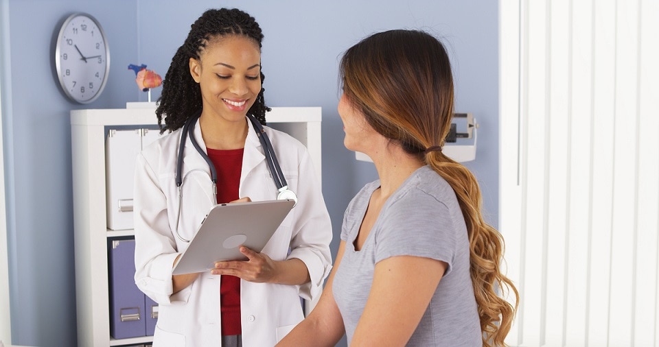 Doctor talking with a patient.