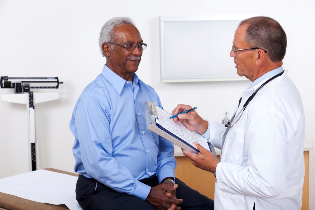Patient speaking with a doctor.