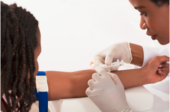 A health care professional drawing blood from a woman’s arm.