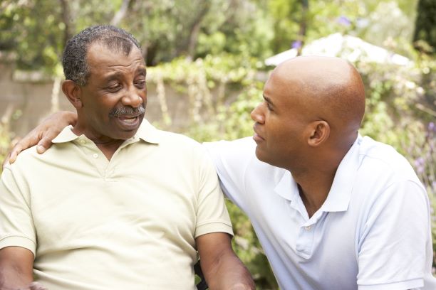 Concerned son talking to his father.