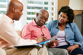 Couple meeting with their health care provider.