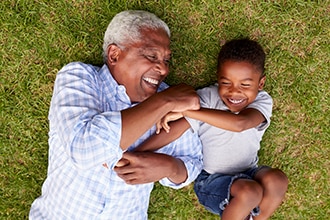 Grandfather and grandson playing together.