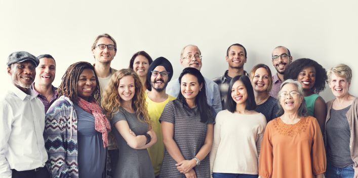 A large, multicultural group of men and women of all ages.