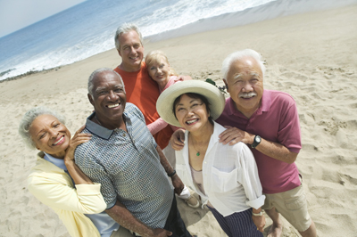 Three older couples at the beach.