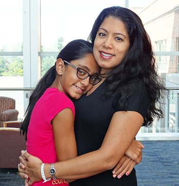 A photo of Radhika and her daughter