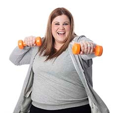 A woman exercising with small dumbbells in her hands