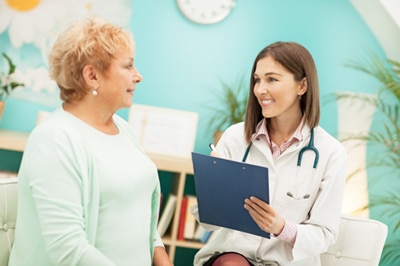 Woman talking with a doctor