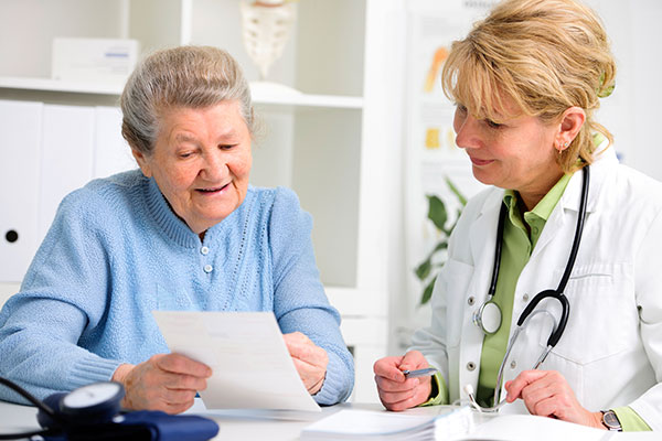 Image of doctor speaking with patient