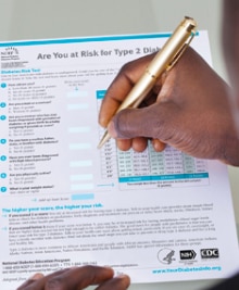 Man completing diabetes risk assessment.