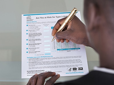 A man filling out the Diabetes Risk Test