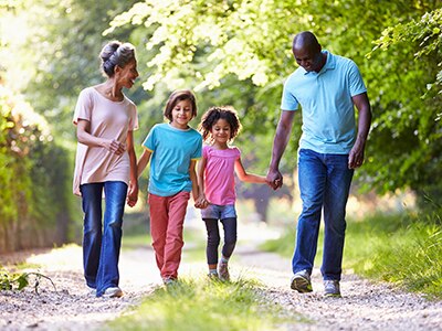 A family outside walking together