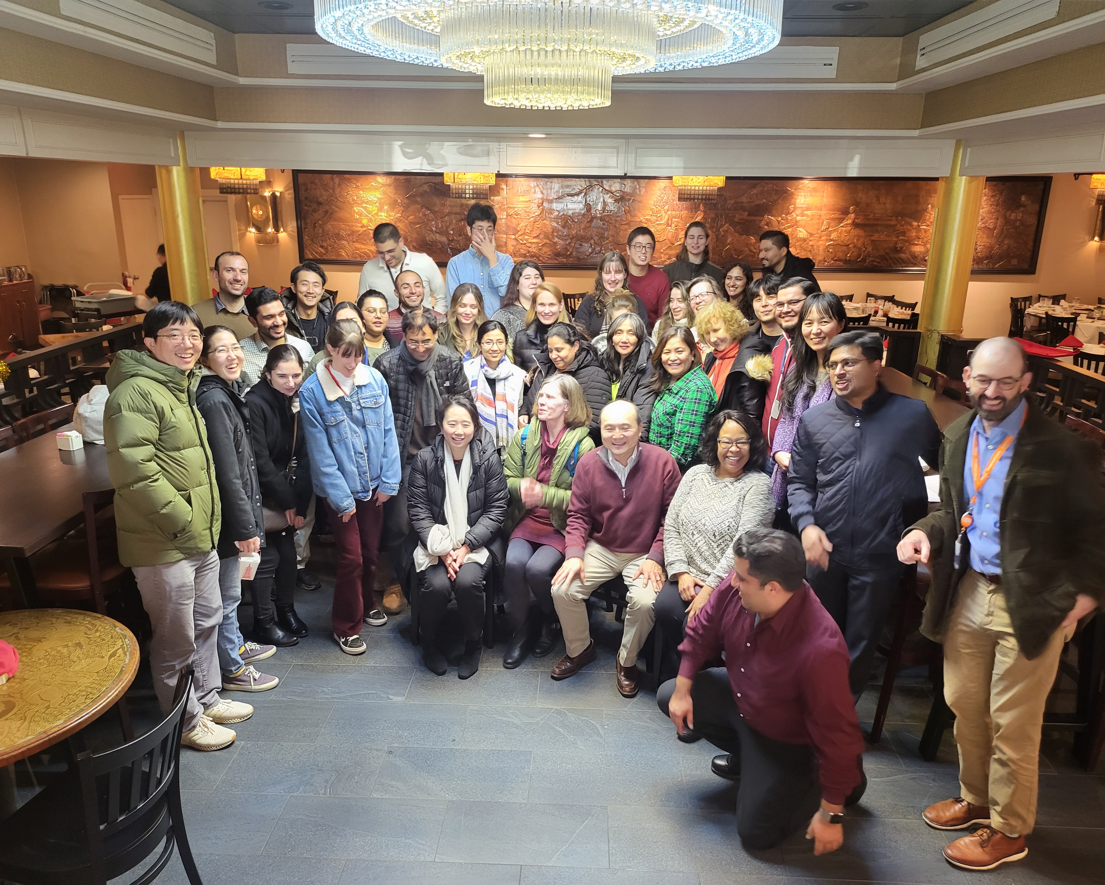 Fellows and staff posing and smiling.