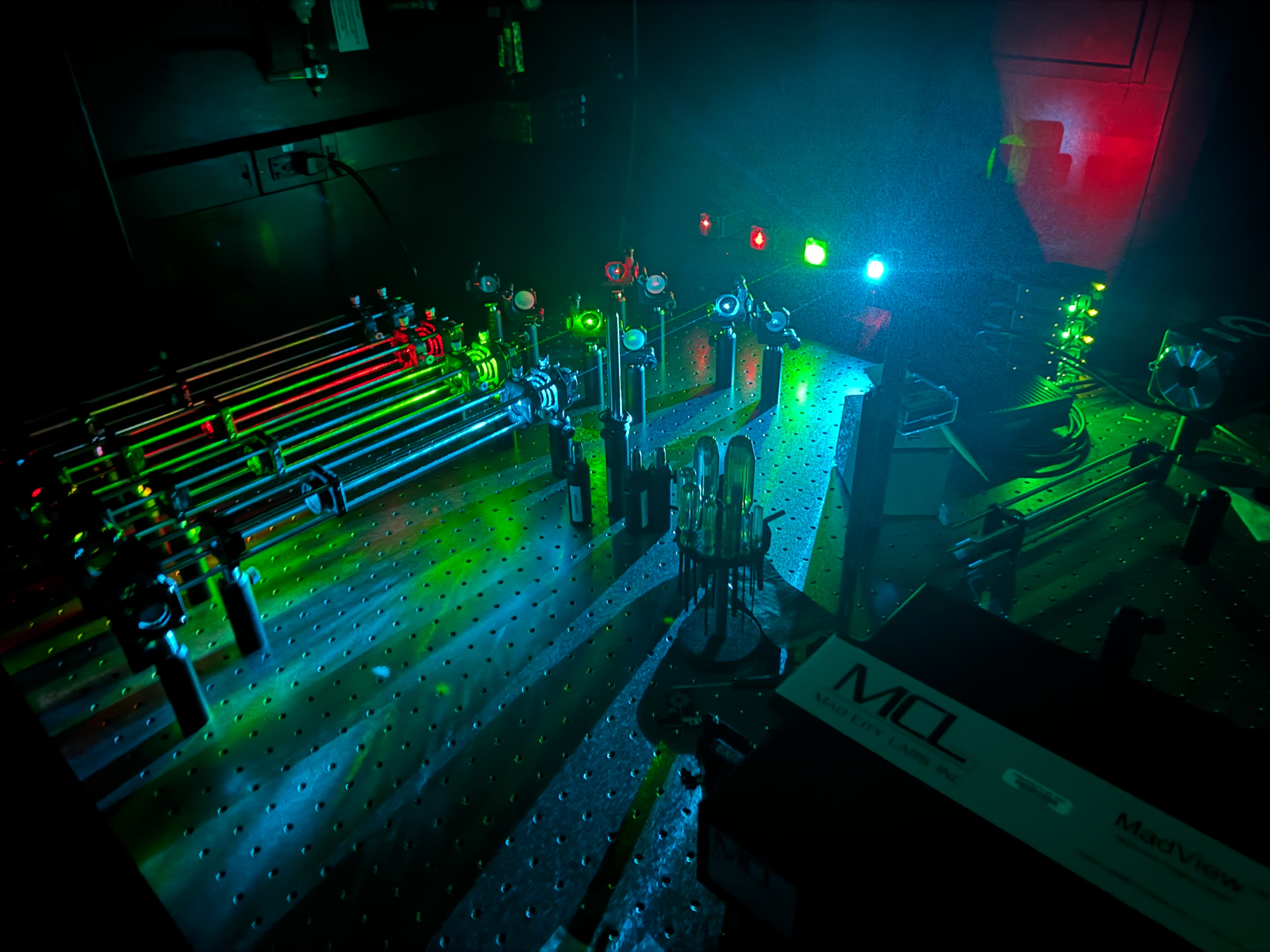 Picture of four laser lines (blue, green, red, and infrared) on a total internal reflection fluorescence microscope used to image single fluorescent biomolecules.