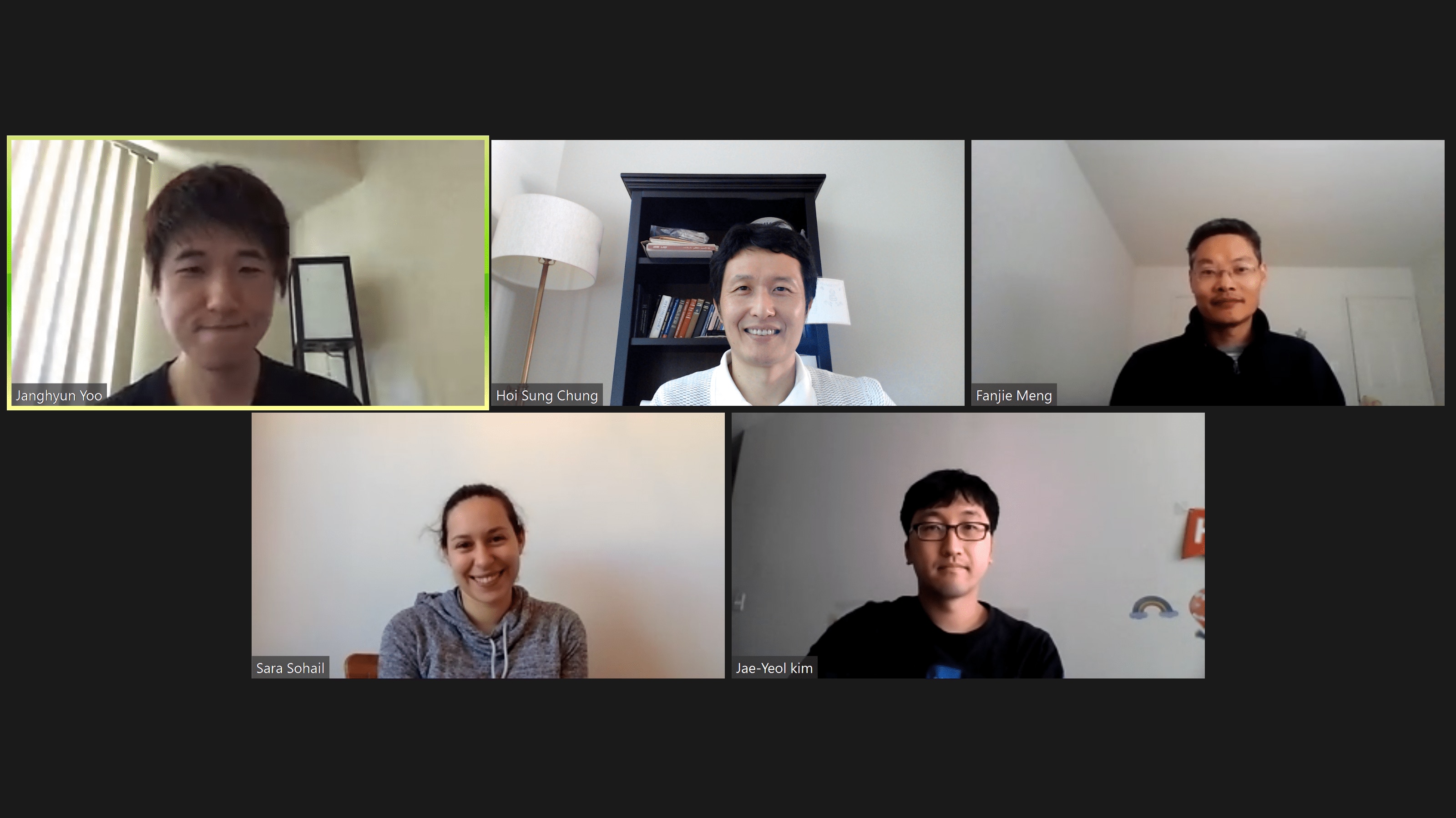 Members of the lab smile during a virtual meeting.