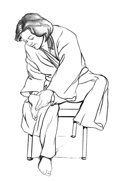 Drawing of a woman dressed in a bathrobe sitting in a chair and checking the bottom of her left foot.