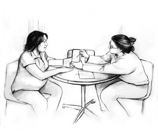 Drawing of a pregnant woman sitting at table with a female dietitian. They are discussing a healthy eating plan. The dietitian is pointing to a checklist.