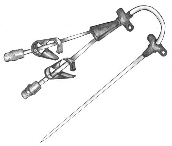 Drawing shows close-up of the catheter that includes caps, clamps, arterial line and venous line.