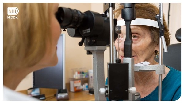 An older adult receiving an eye exam.
