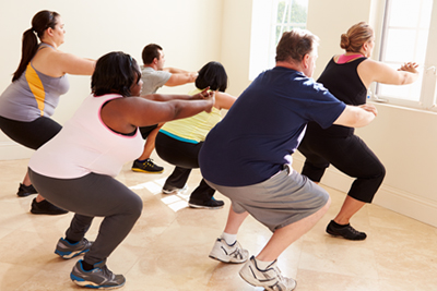 Group of men and women in an exercise class